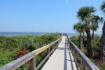 Boardwalk access to beach located steps from your condo and pool
